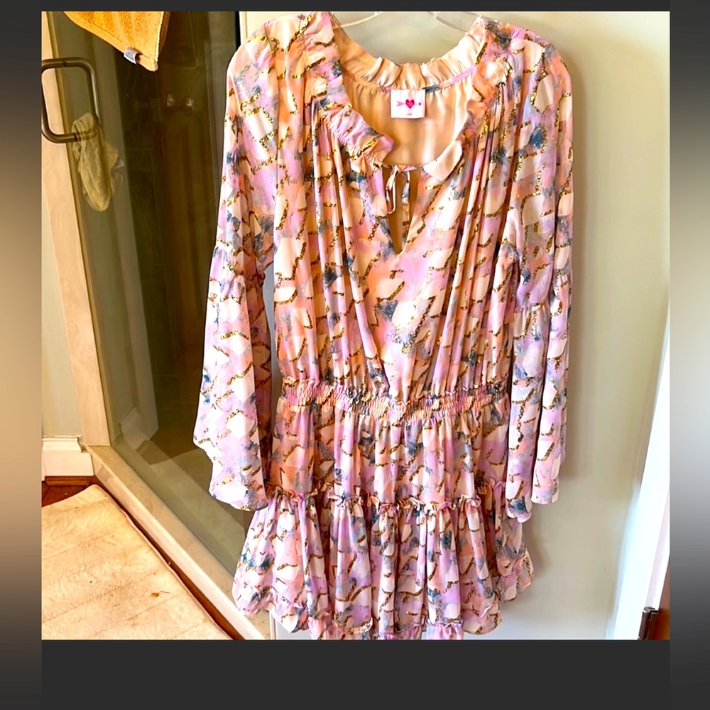 Large Buddy Love dress w bell sleeves. Gold accents in the dress.